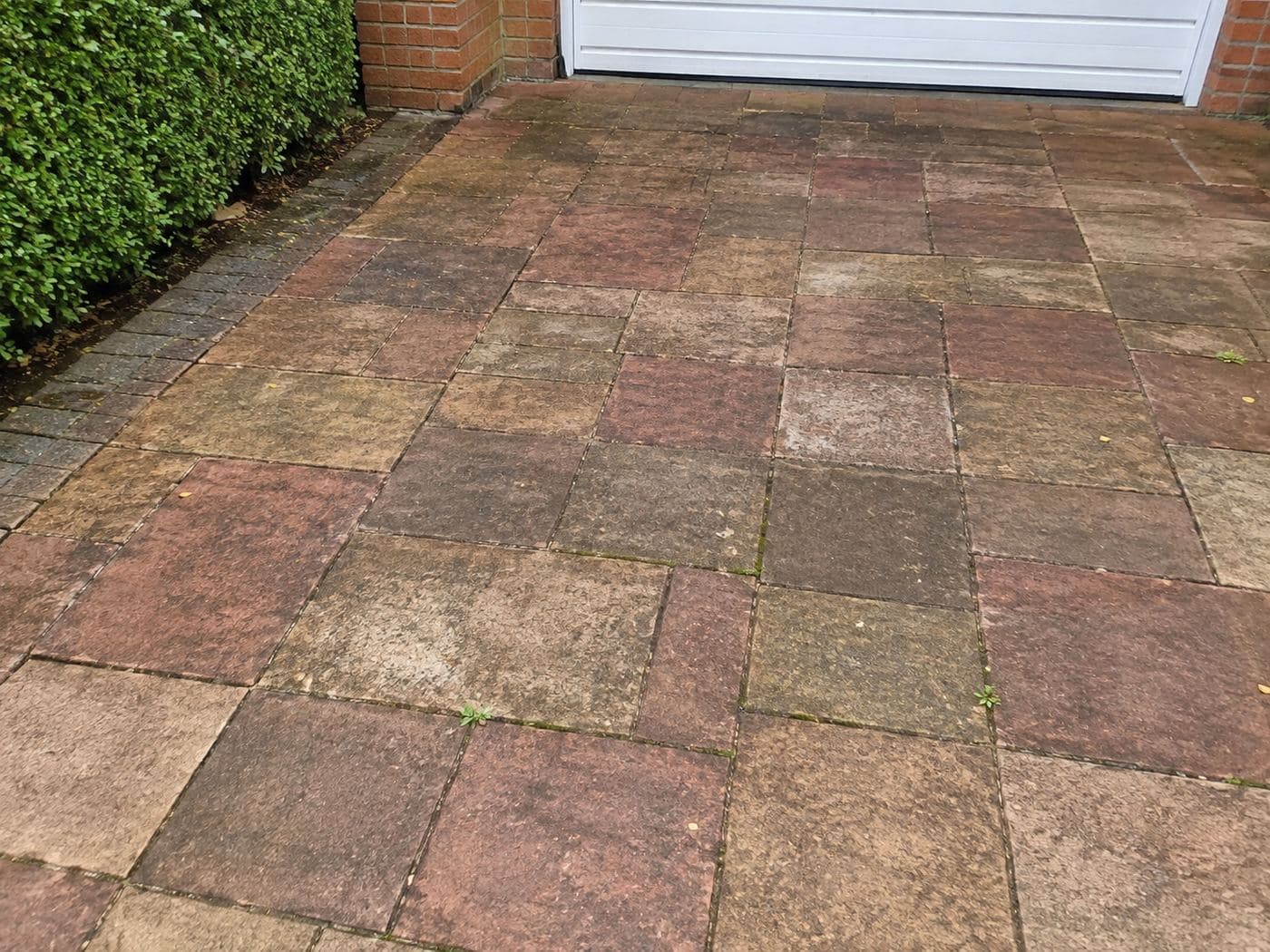 Pressure-washed driveway - before